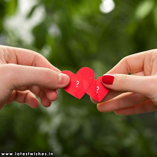 double heart on couple hand with alphabet name on image